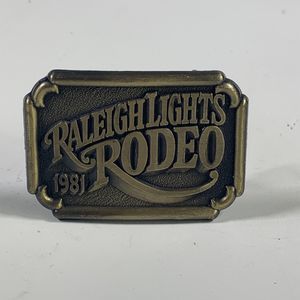 Vintage 1981 RALEIGH LIGHTS RODEO Brass Belt Buckle, Cigarette Brand NEW